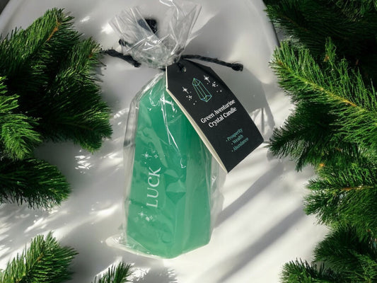 Manifestation candle with raw aventurine