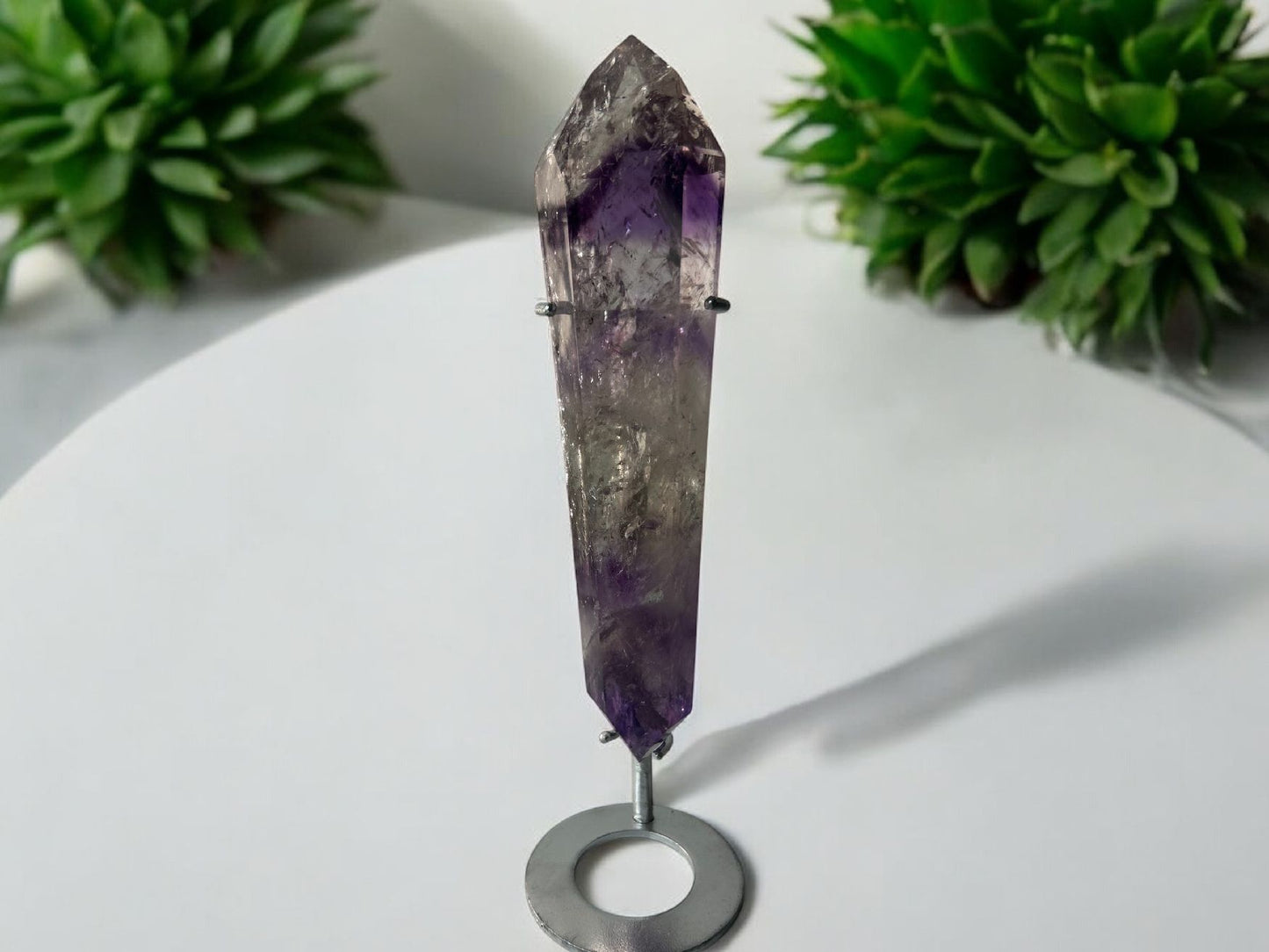 Phantom quartz with amethyst inclusions