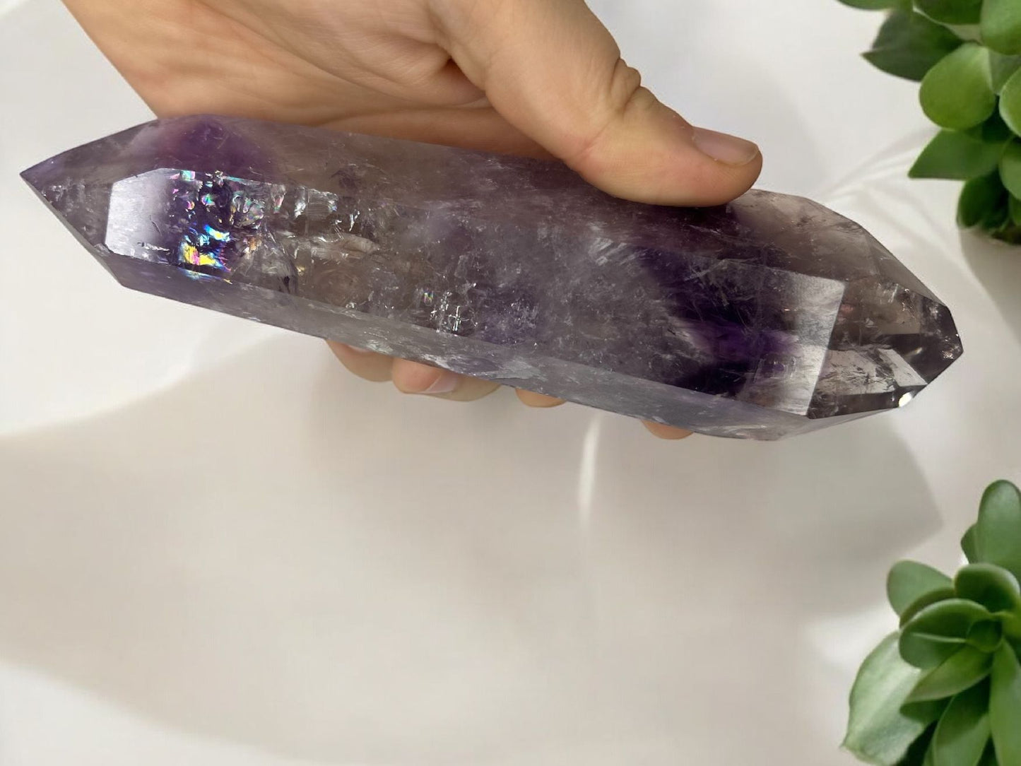 Phantom quartz with amethyst inclusions